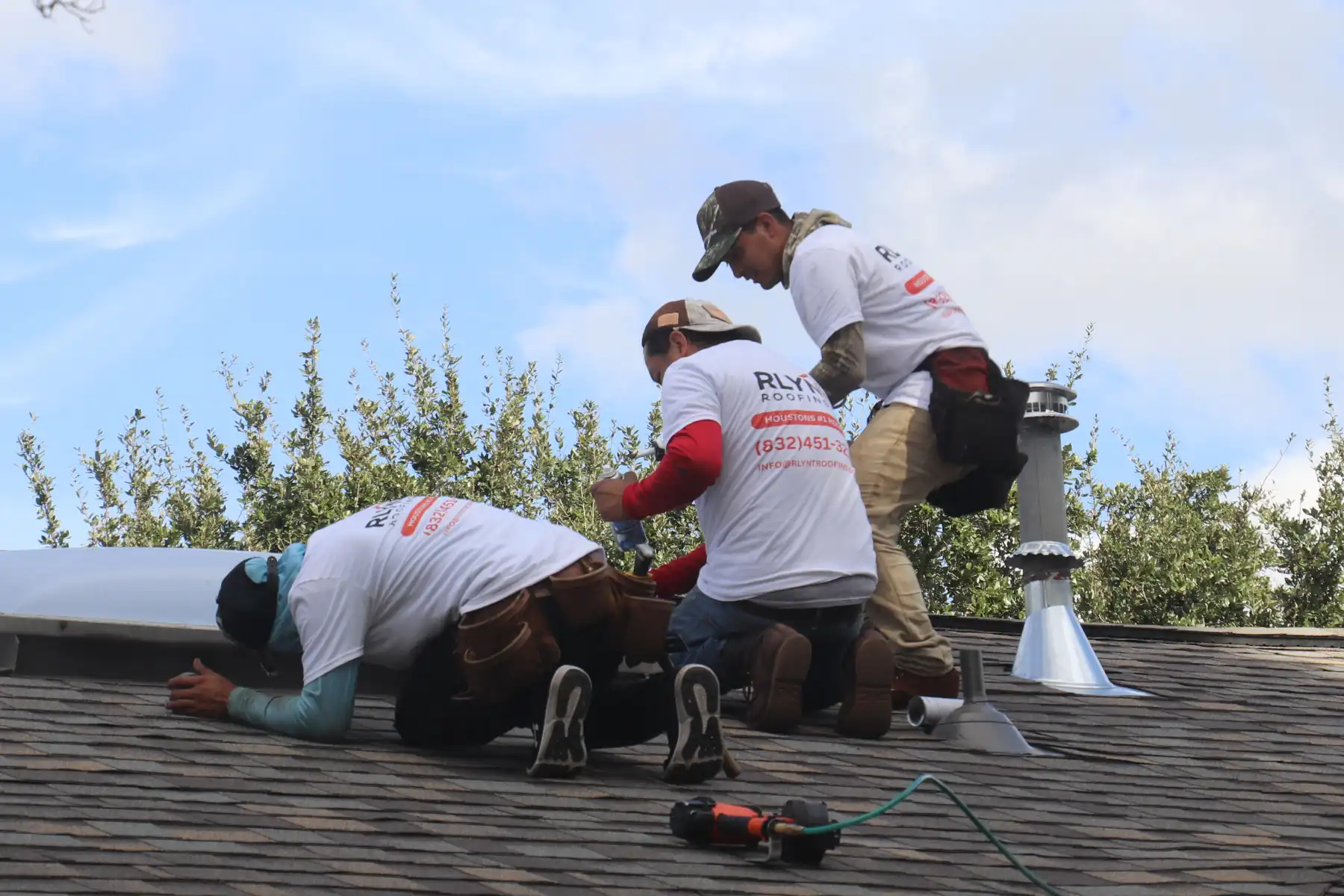 Rlynt Roofing crew installing a new roof system in Greater Houston