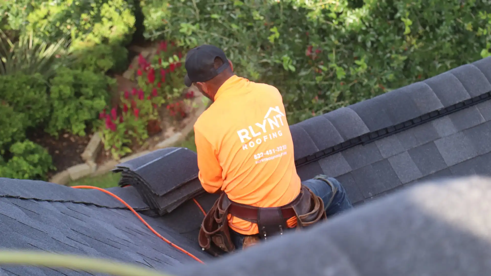 Rlynt Roofing crew installing a new roof in Katy, TX