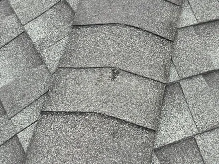 Roof hail damage missouri city texas one point five inch april 3 2026 four — hail-damaged roof documented for an insurance claim in Greater Houston